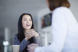 women smiling together