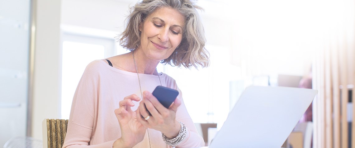 women checking phone