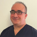 A headshot of Miltiadis Papamichail, Dentist at Bupa Dental Care Teignmouth