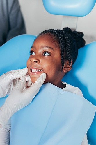 Young girl in the dentist chair