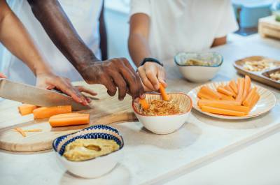 People making hummus