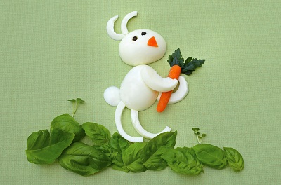 Bunny made out of boiled eggs, carrots and spinach