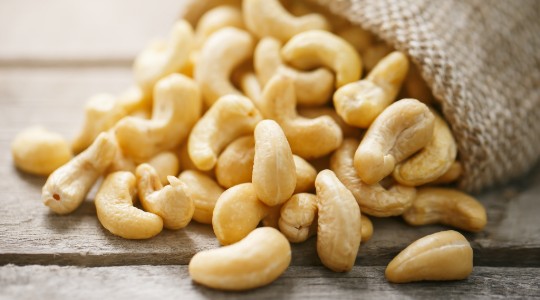 Bag of cashew nuts on table