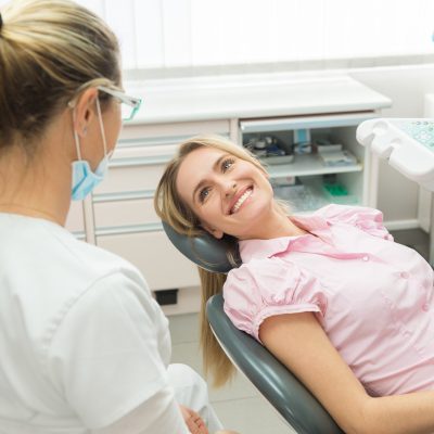 Woman in dentist chair before dental treatment.