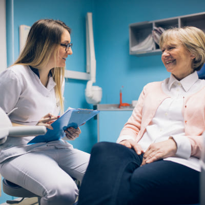 Dentist and patient discussing a treatment plan.