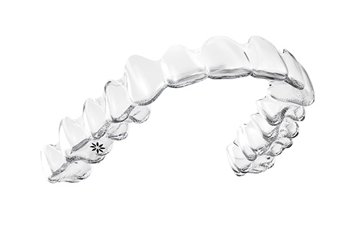 Photo of invisalign clear aligner on  white background