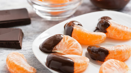 Tangerine segments dipped in dark chocolate