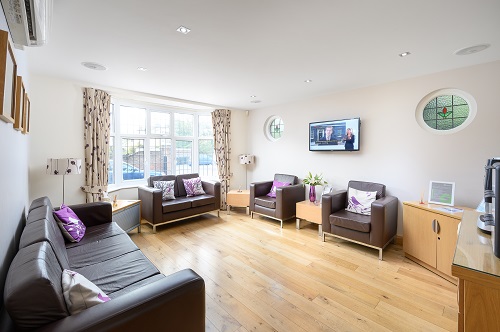 Waiting area filled with sofas at The Perlan Specialist Dental Centre