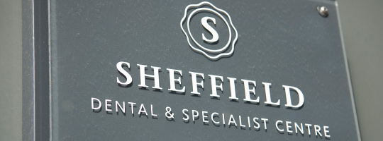 Sign showing the logo and branding for Sheffield  Dental and Specialist Centre