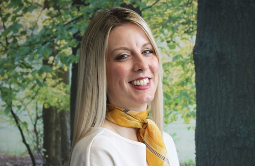 Carrie is a receptionist at Hospital Lane