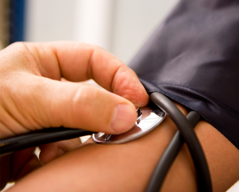 doctor taking blood pressure