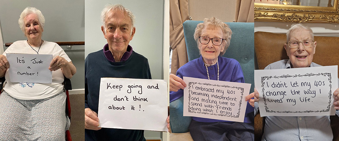 Ashby Court and Elmwood residents holding handwritten messages about ageing positively and life advice