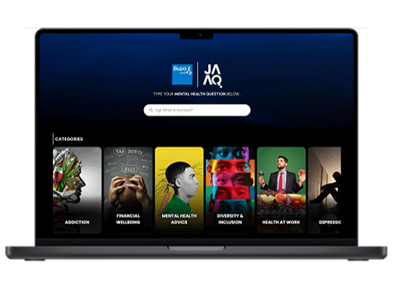 Laptop displaying JAAQ mental health platform homepage with search bar and topic categories