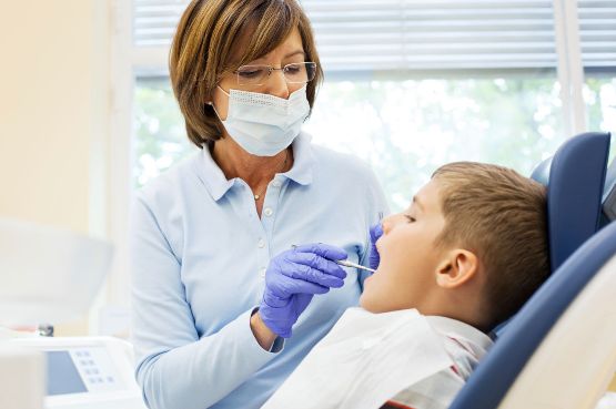 Image of a boy having a dental check-up