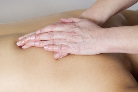 Chiropractor working on someone's back