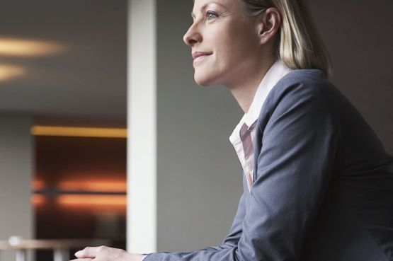 Business woman in grey suit