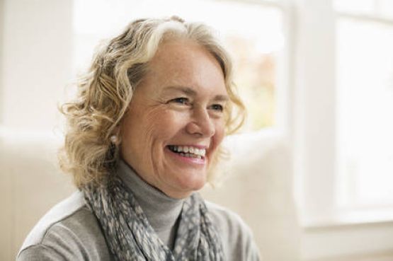 An older woman smiling