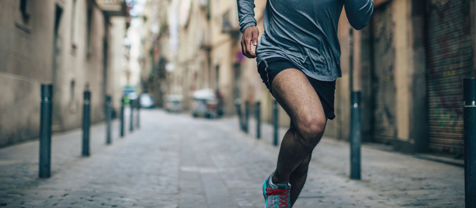 Man running down a street