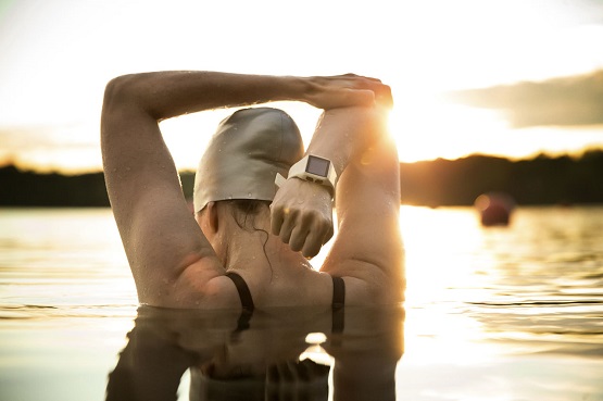 Photo of a woman swimming outdoors
