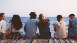 Group sitting on dock